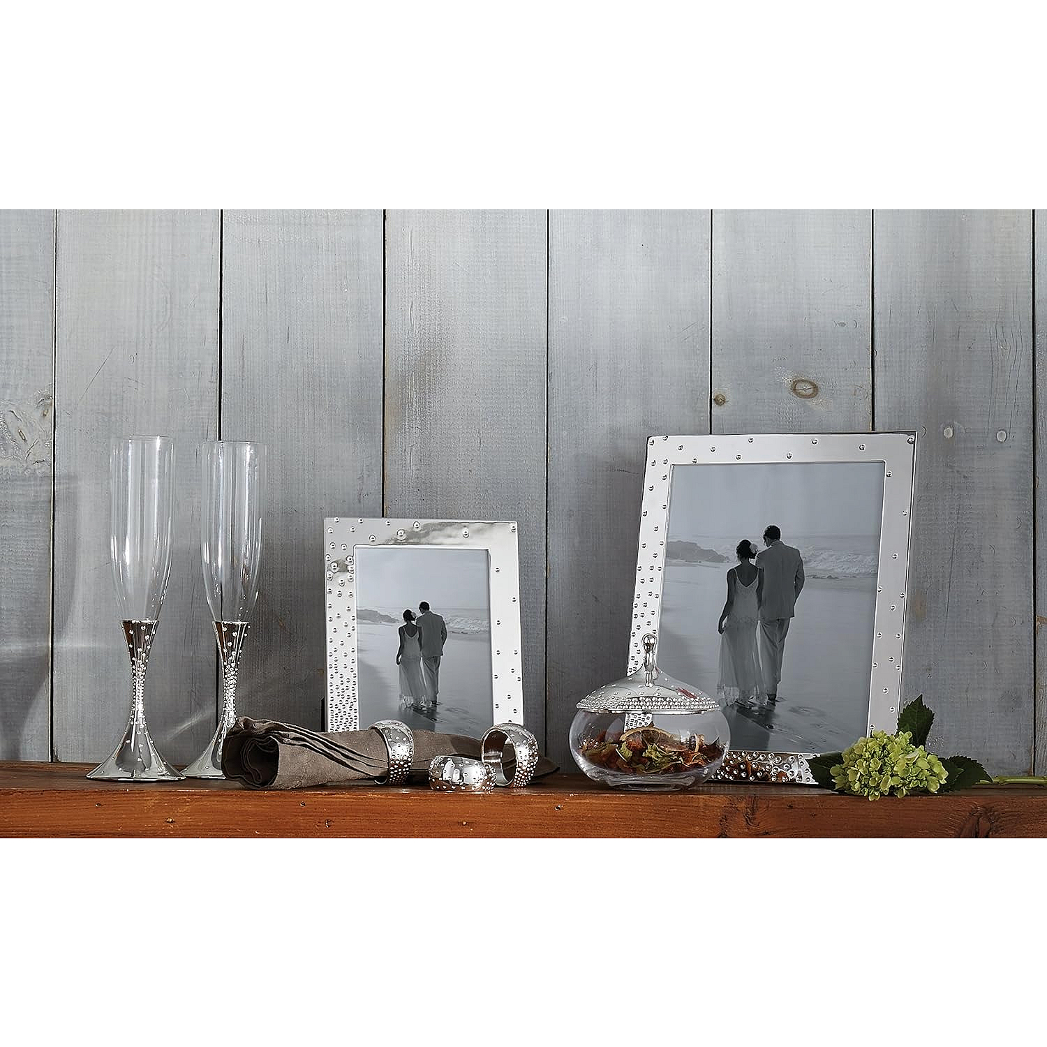 Nambé modern frames — alloy borders with sculptural curves